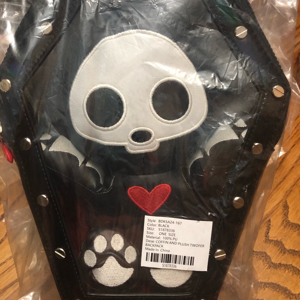Dolls Kill Black and White Coffin Backpacks